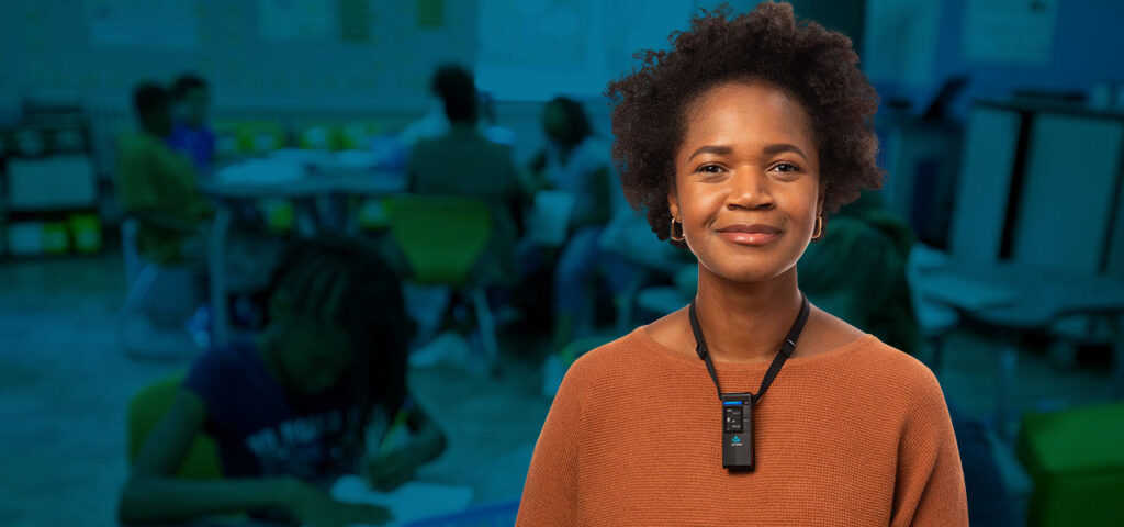 Clearmike Home Banner 10 Teacher wearing new Clearmike as a part of the new Cascadia Instructional Audio system in her class.